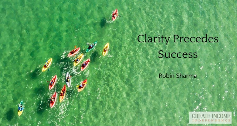 Boats in clear water showing you need clarity for success