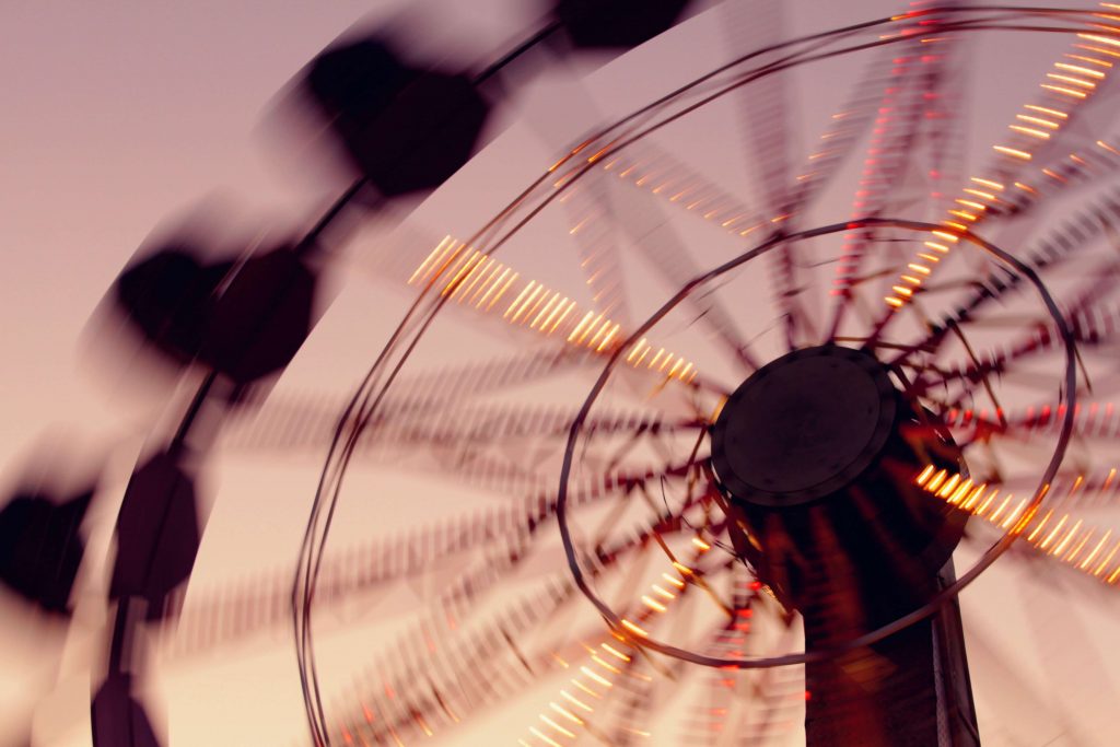 Ferris wheel that represents a flywheel.
